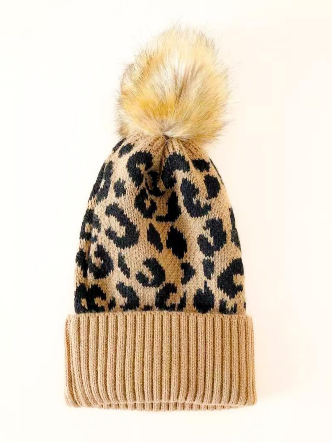 The Lala Knit Animal Print Cuff Beanie with Faux Fur Pom Detail in Tan