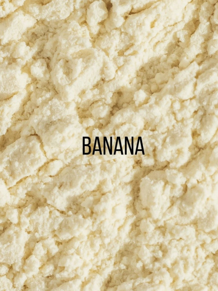 A close-up texture shot of a crumbly, off-white powder, labeled with the word &