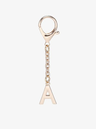 Gold Letter Bag Charms. A