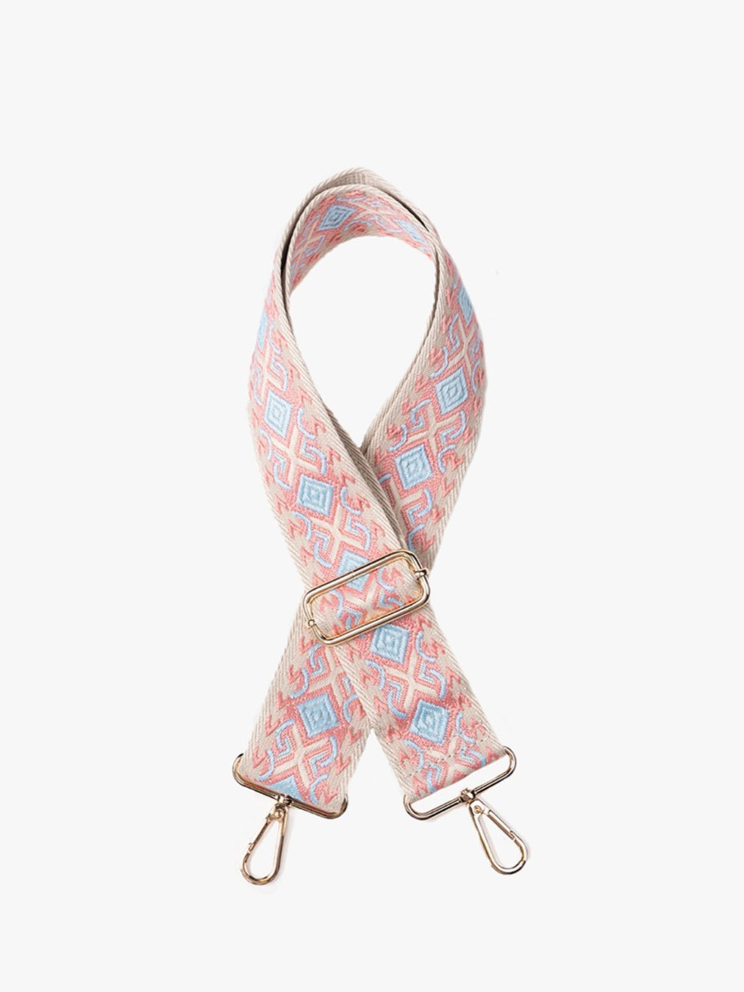 A fabric camera strap featuring a pink, blue, and white geometric pattern, with gold-tone metal hardware and clips, shown on a plain light gray background.