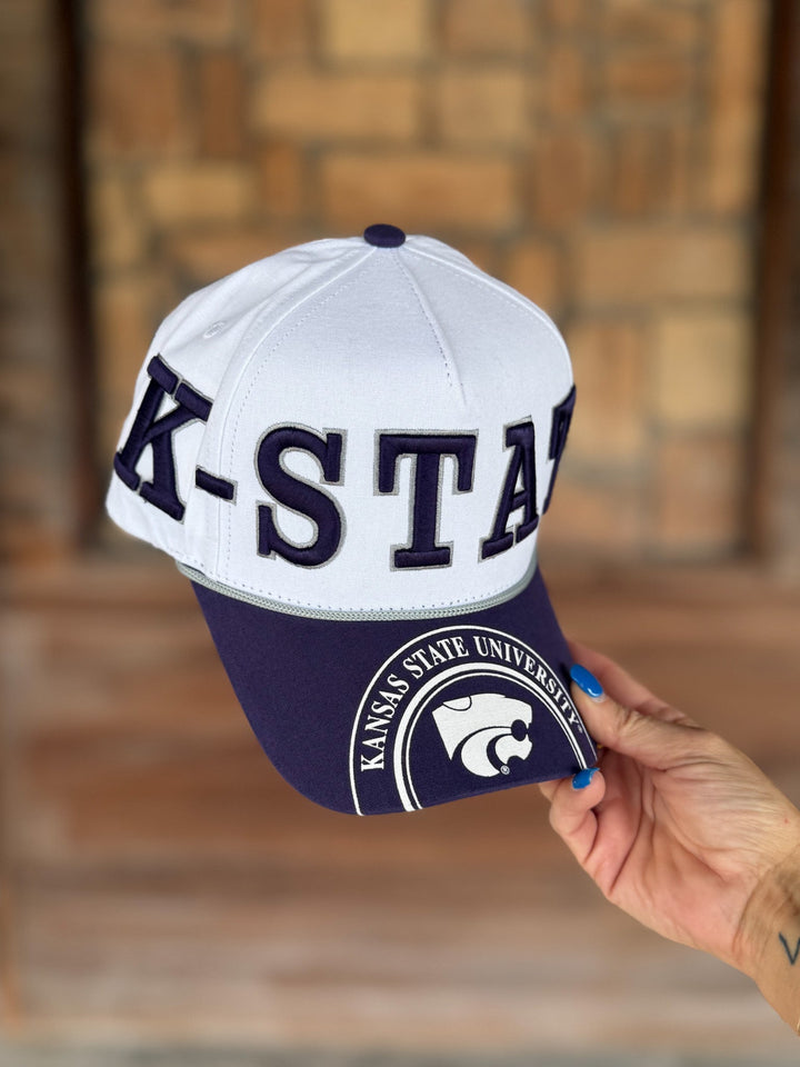 A white and purple blue baseball cap with &