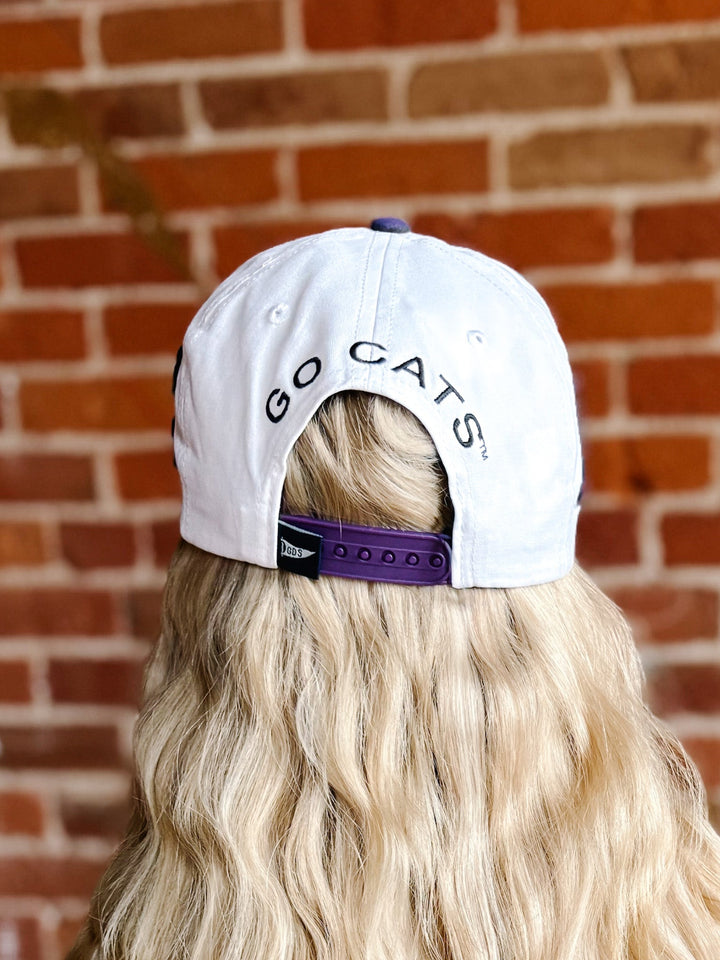 A white baseball cap with &