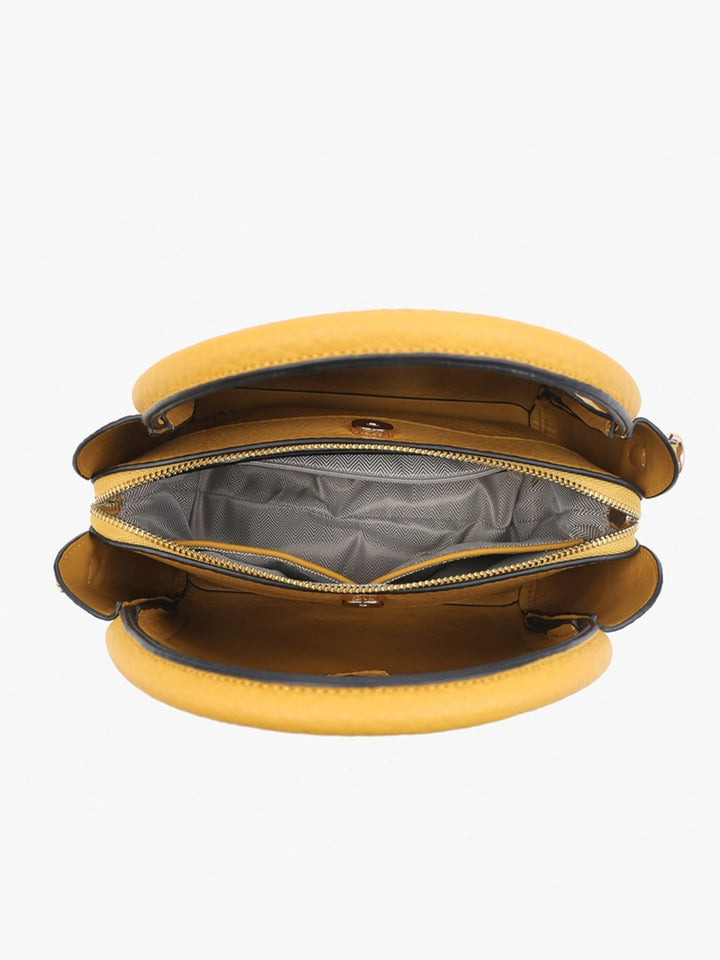 A yellow leather clutch bag shown open from a top-down view, revealing a gray interior lining and gold-tone zipper.