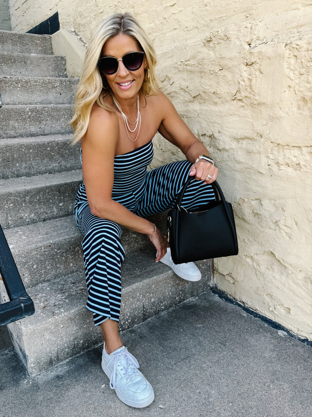 Woman wearing Scottie Triple Chain Necklace in Matte Silver with striped top