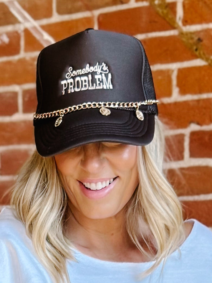 Somebodys Problem Trucker Hat, Brown