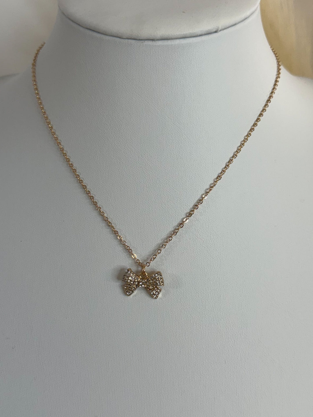 Sweet Charm Bow Necklace. Gold