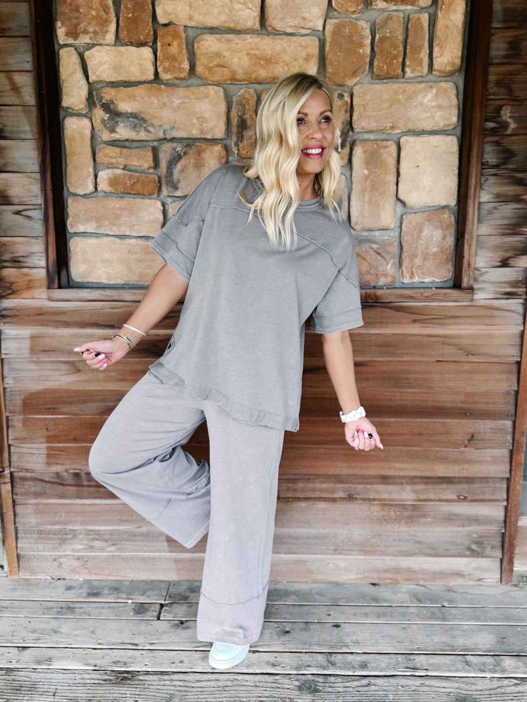 Mocha-colored mineral wash tee with a relaxed, oversized fit and raw edge details.