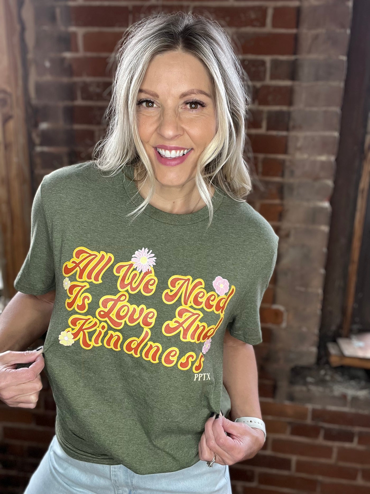 Retro All We Need Is Kindness Graphic Tee in Heather Olive